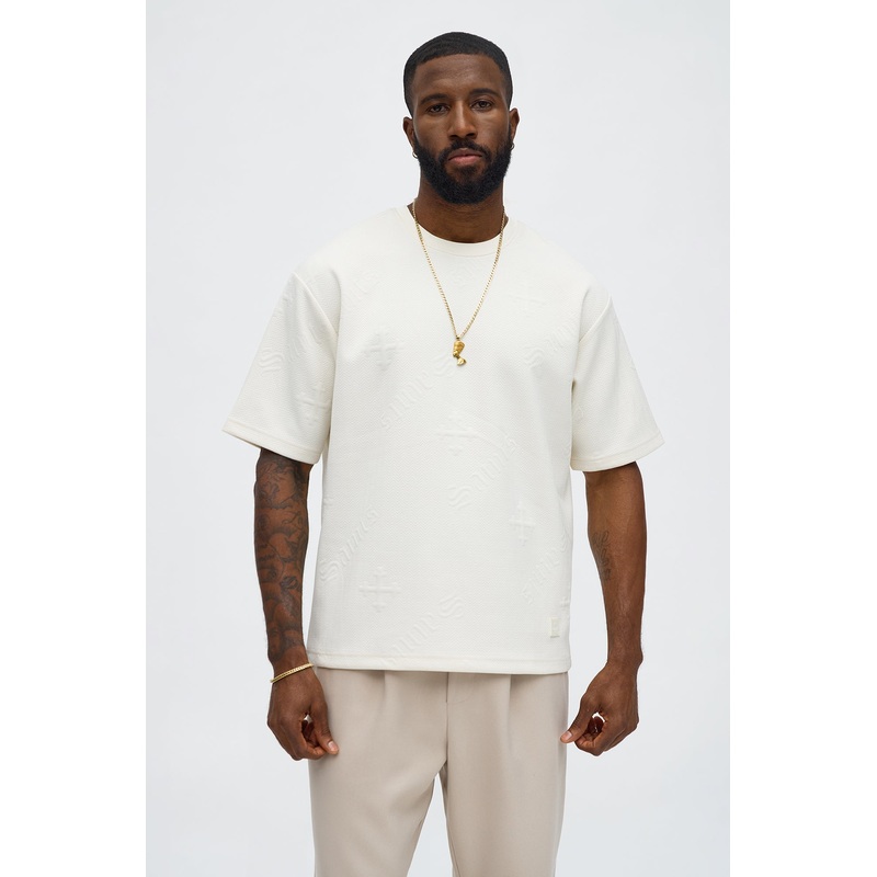 Saints Embossed Crew Tee – Cream